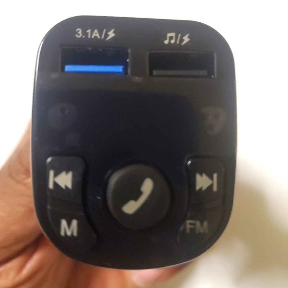 Digital Phone Charger with phone and FM on/off buttons.